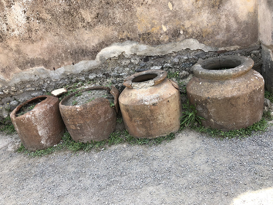Ancient pots, once held grains, oils, and other foodstuffs, Pompeii.