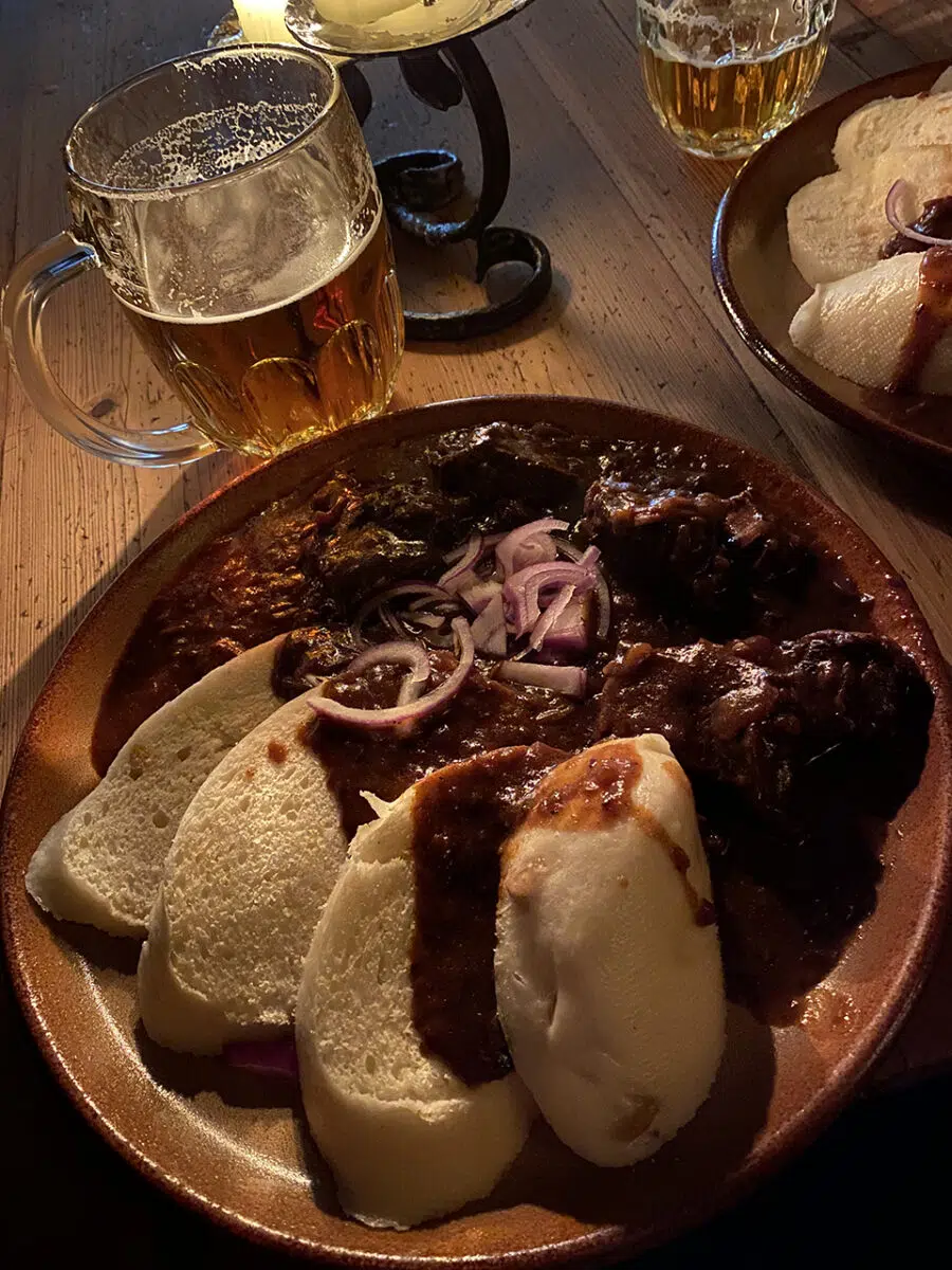 Spend three days in Prague and eat at a medieval tavern.