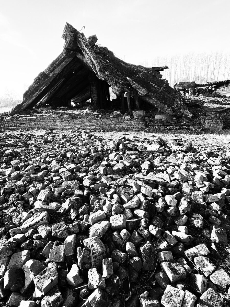 Remains of gas chamber and prison blocks, Auschwitz.