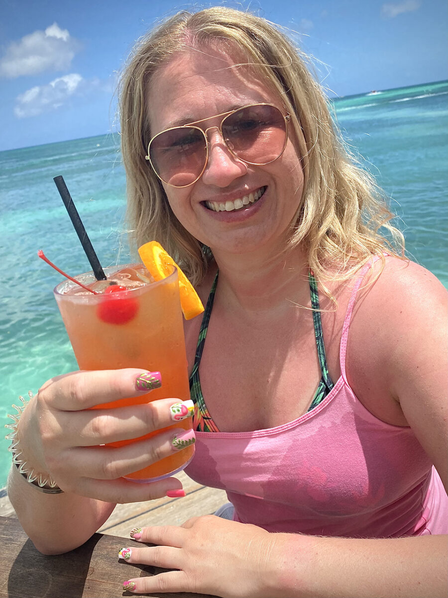 Vicky enjoying a much needed cocktail at Bugaloe, Aruba.
