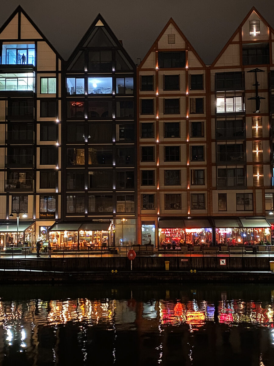 Explore the waterfront on a night in Gdańsk.