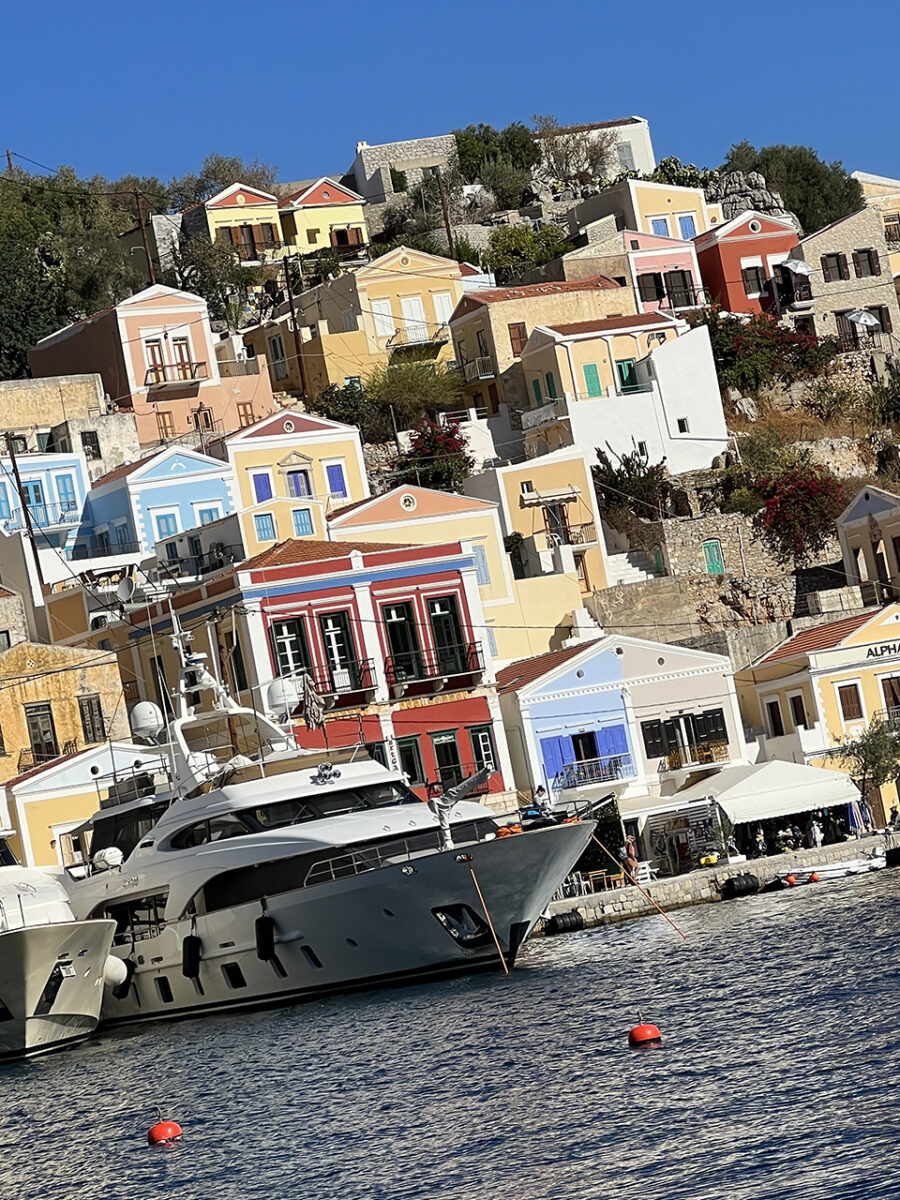 The colourful hillside buildings of Symi, Greece.