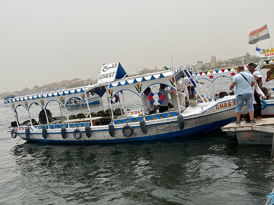 Taking a boat across the Nile River, Egypt.