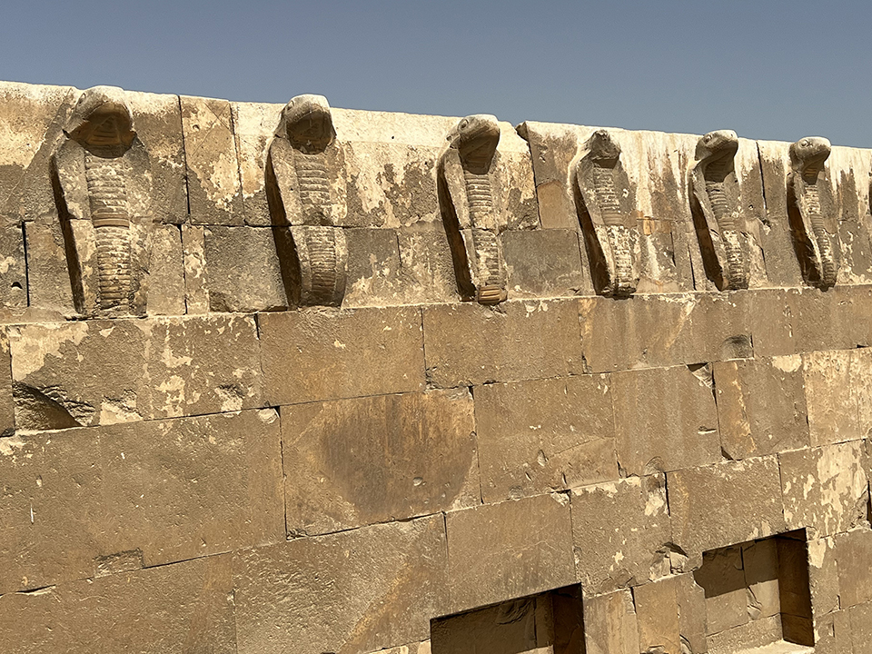 The wall of cobras, Saqqara Necropolis, Egypt.